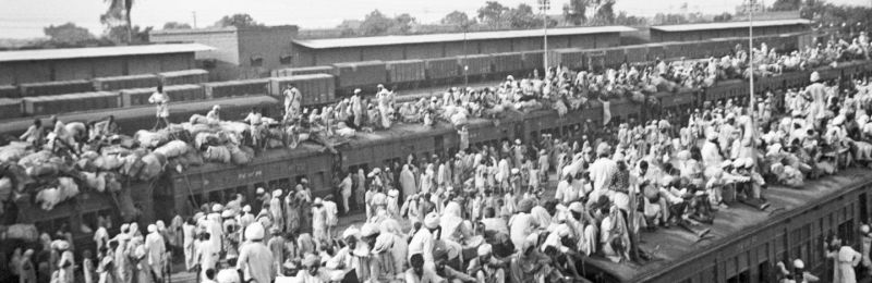Scene of people migrating on trains in Partition.